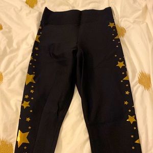 Ultracor leggings 7/8. Gold stars down side. Worn once